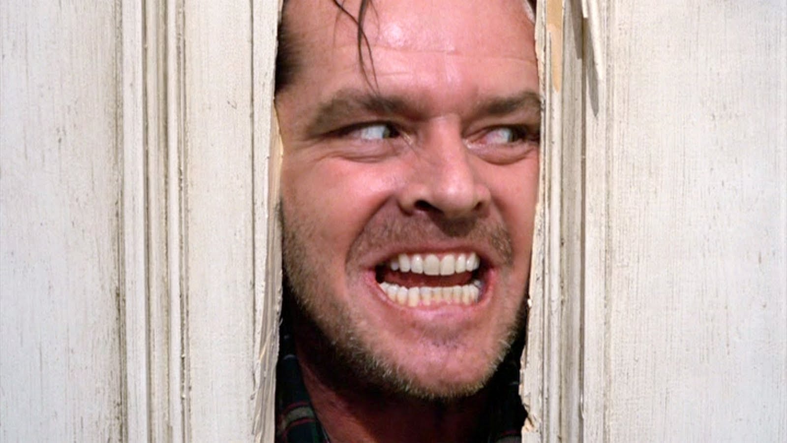 Jack Nicholson bursting through a door from The Shining